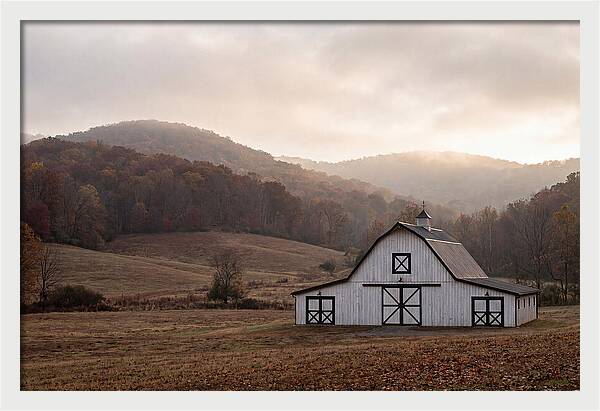 White Barn Against Autumn Landscape