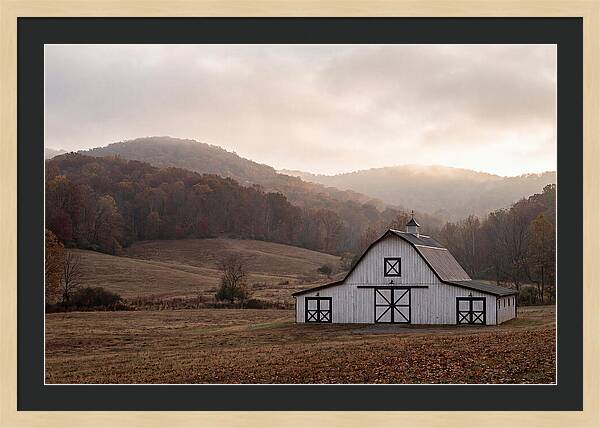 White Barn Against Autumn Landscape