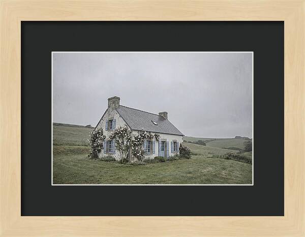 Whitewashed Cottage With Blue Shutters