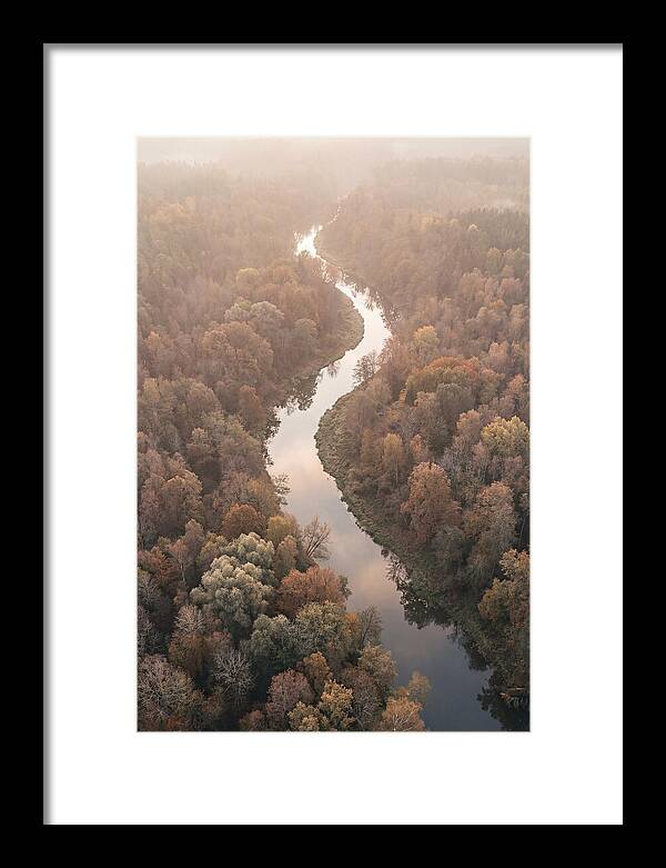 Winding River Through Autumn Forest