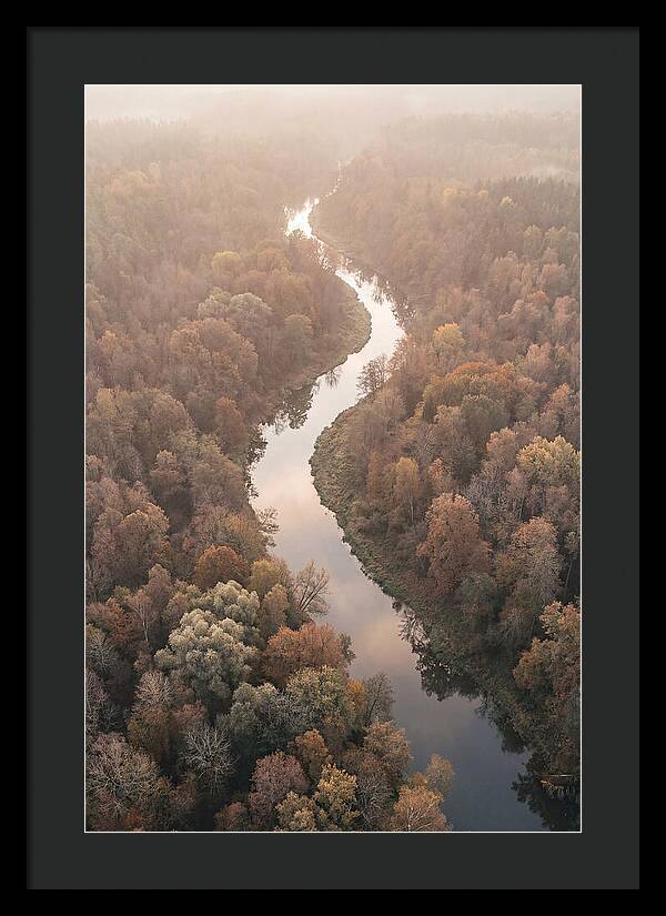 Winding River Through Autumn Forest