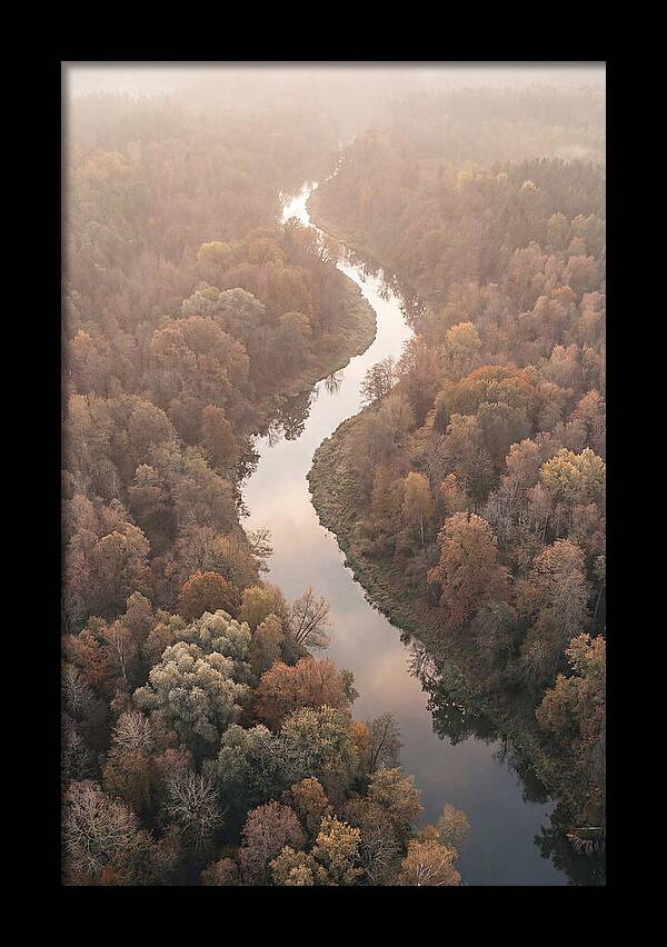 Winding River Through Autumn Forest