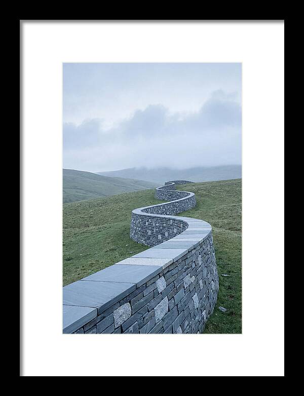 Winding Stone Wall Through Green Hills