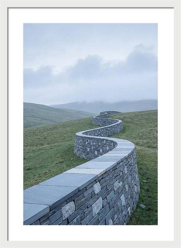 Winding Stone Wall Through Green Hills