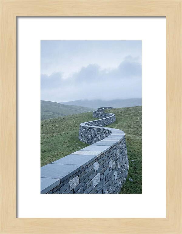 Winding Stone Wall Through Green Hills