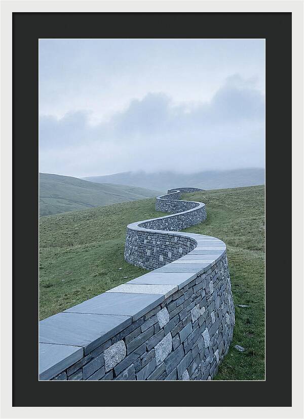 Winding Stone Wall Through Green Hills