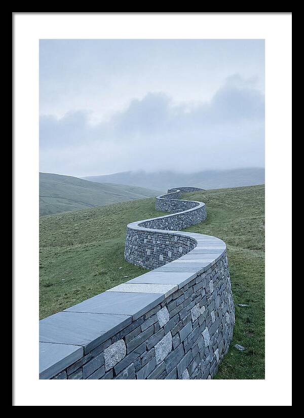 Winding Stone Wall Through Green Hills