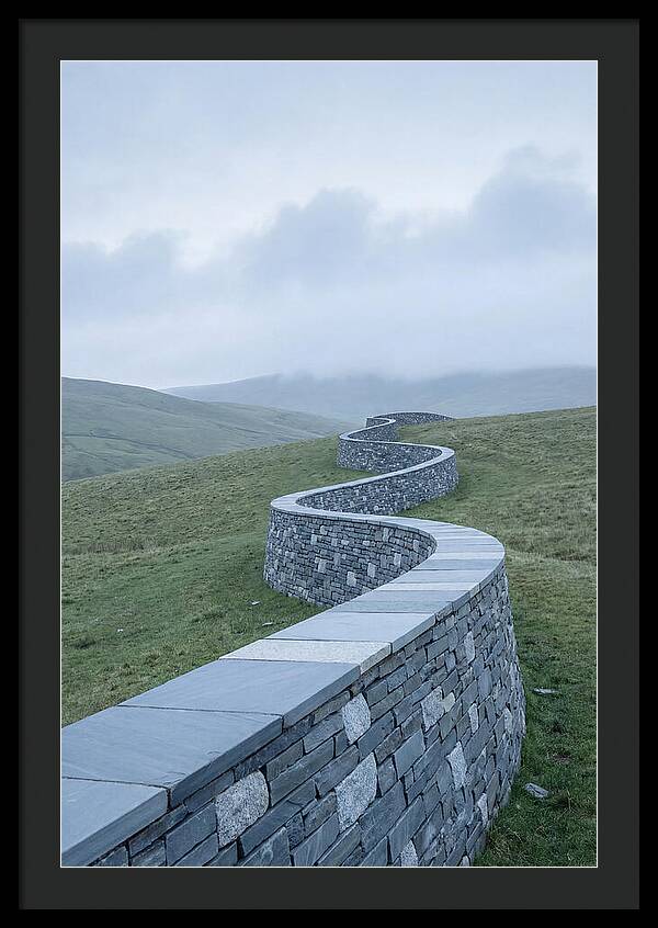 Winding Stone Wall Through Green Hills