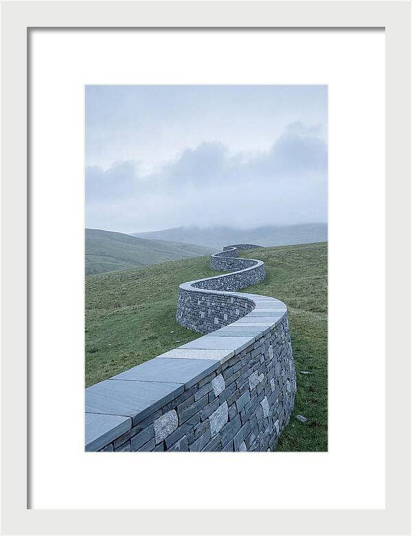 Winding Stone Wall Through Green Hills