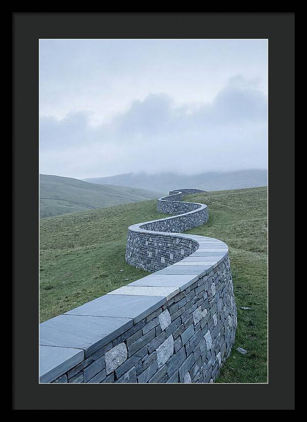 Winding Stone Wall Through Green Hills