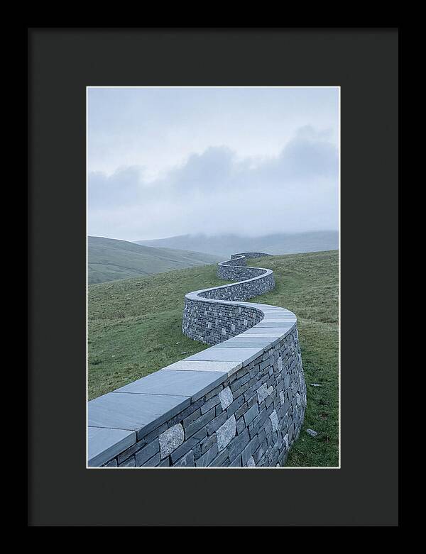 Winding Stone Wall Through Green Hills