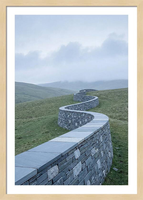 Winding Stone Wall Through Green Hills