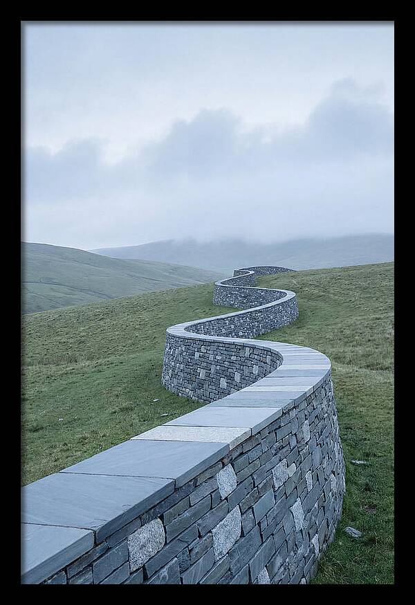 Winding Stone Wall Through Green Hills