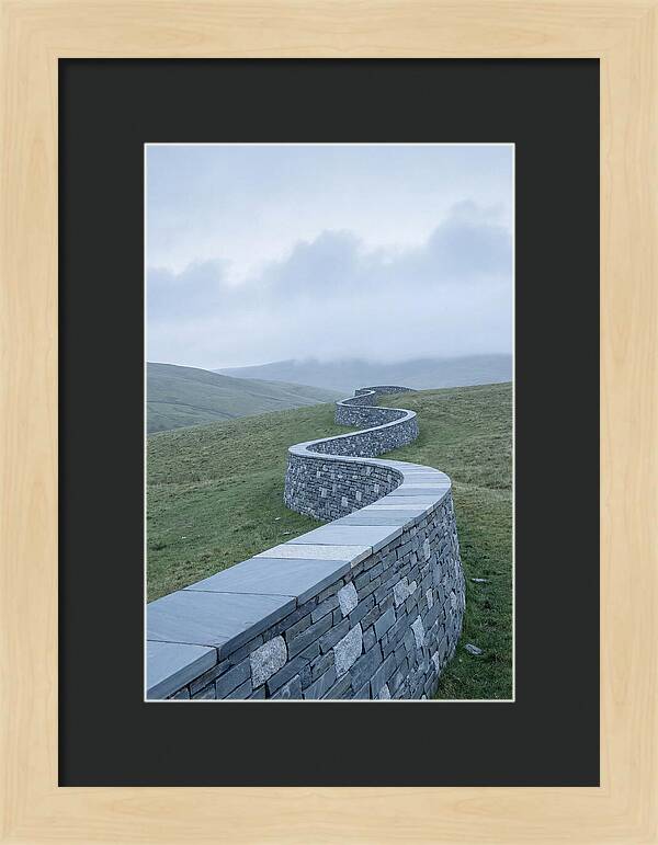 Winding Stone Wall Through Green Hills