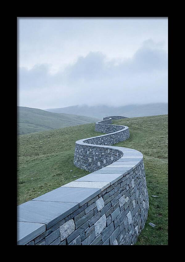 Winding Stone Wall Through Green Hills