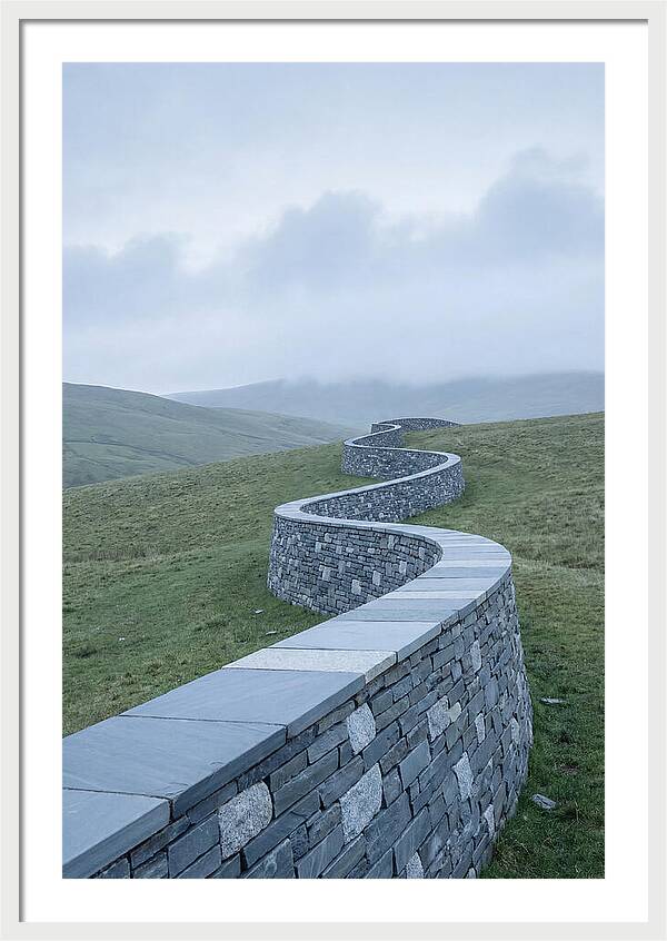 Winding Stone Wall Through Green Hills
