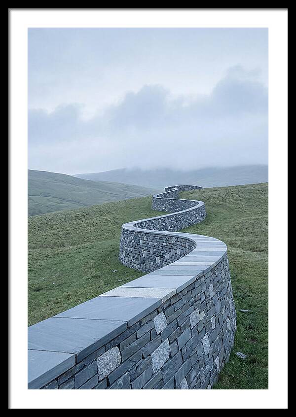 Winding Stone Wall Through Green Hills