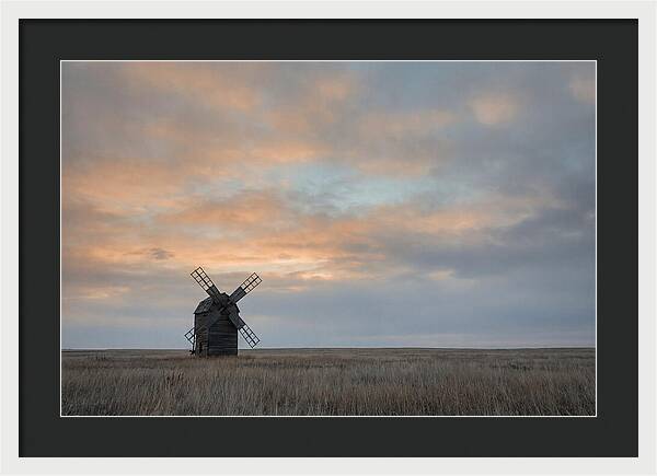 Windmill Silhouetted Against Orange Sky