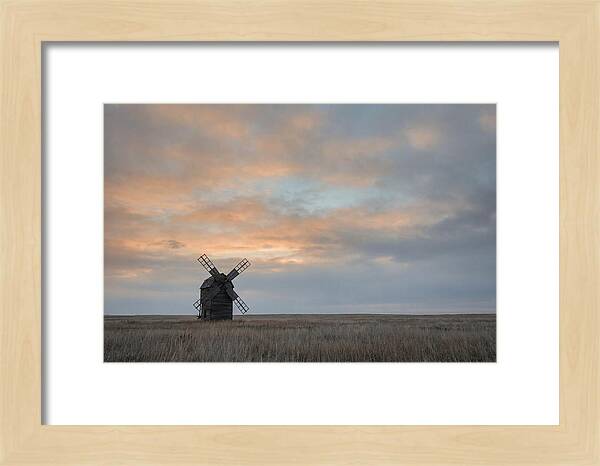 Windmill Silhouetted Against Orange Sky