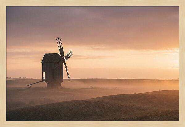 Windmill Silhouetted Against Sunset
