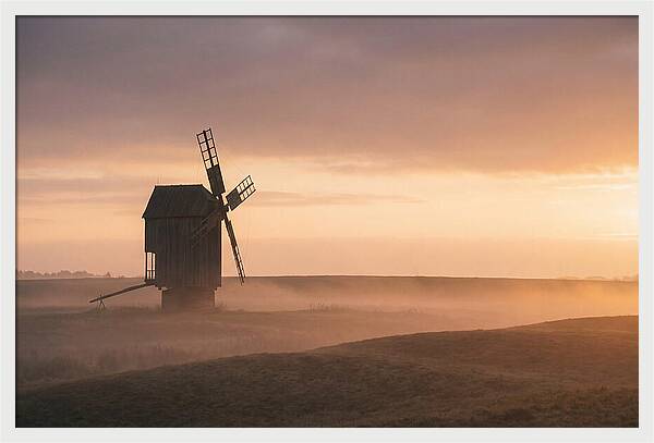 Windmill Silhouetted Against Sunset