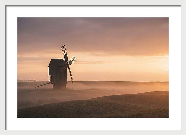 Windmill Silhouetted Against Sunset