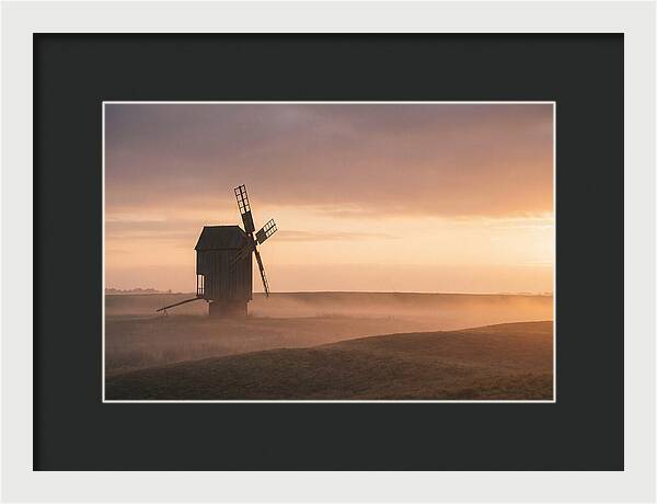 Windmill Silhouetted Against Sunset