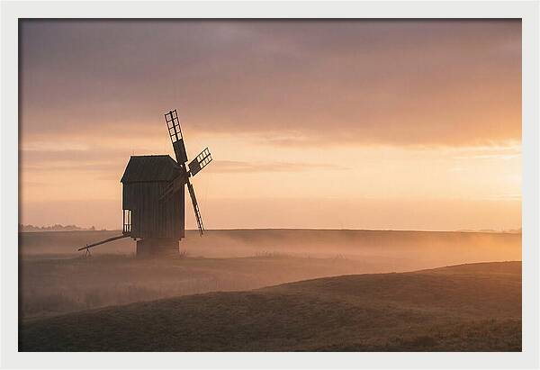 Windmill Silhouetted Against Sunset