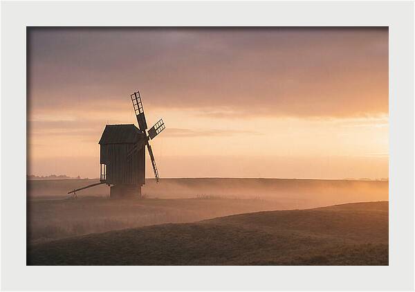 Windmill Silhouetted Against Sunset