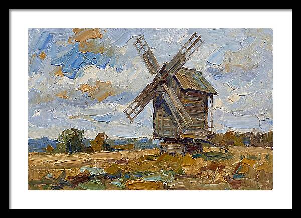 Windmill Under A Cloudy Sky