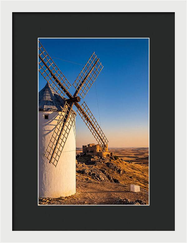 Windmills Against Golden Horizon