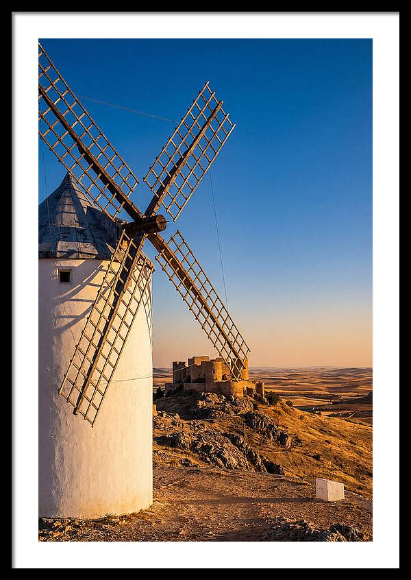 Windmills Against Golden Horizon