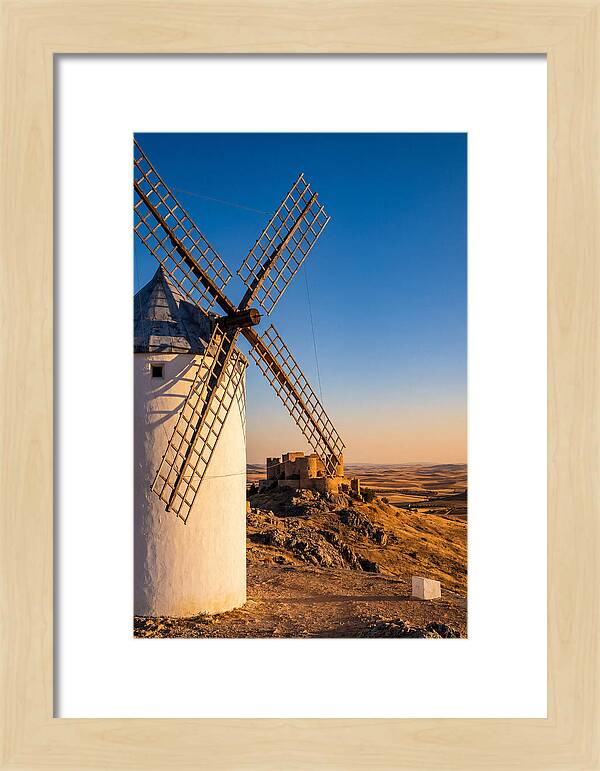 Windmills Against Golden Horizon