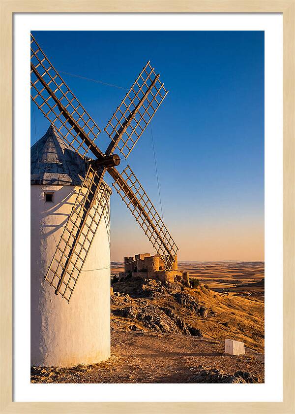 Windmills Against Golden Horizon