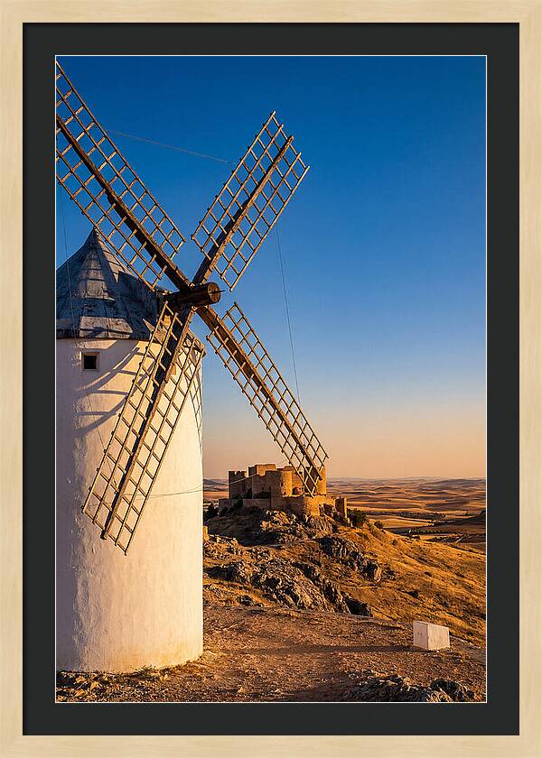 Windmills Against Golden Horizon