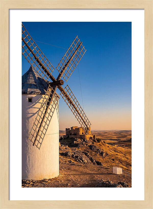 Windmills Against Golden Horizon