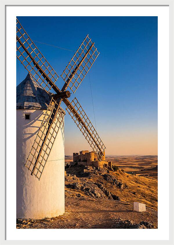 Windmills Against Golden Horizon