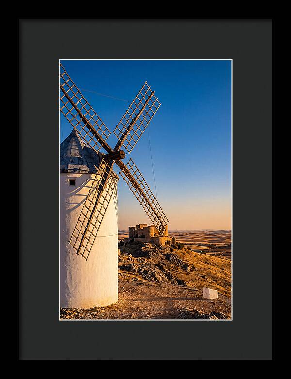 Windmills Against Golden Horizon
