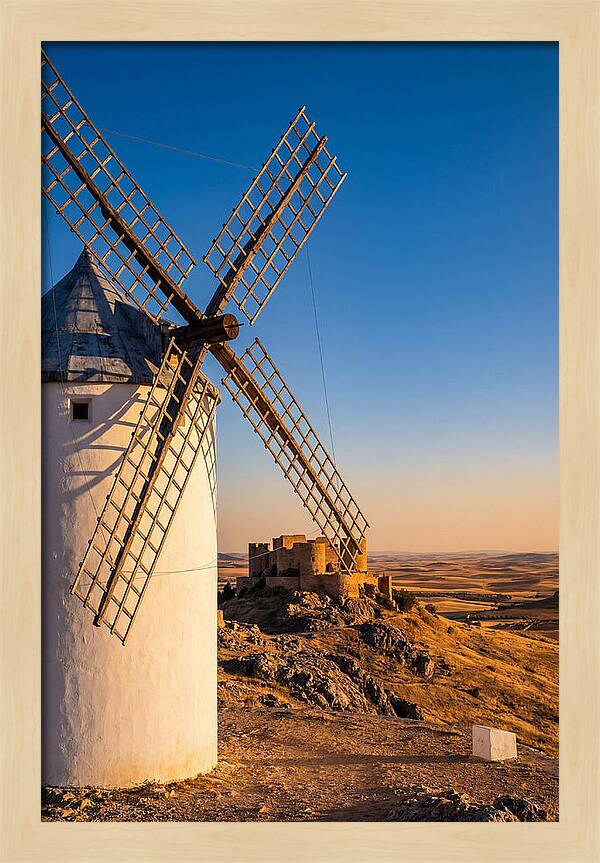 Windmills Against Golden Horizon