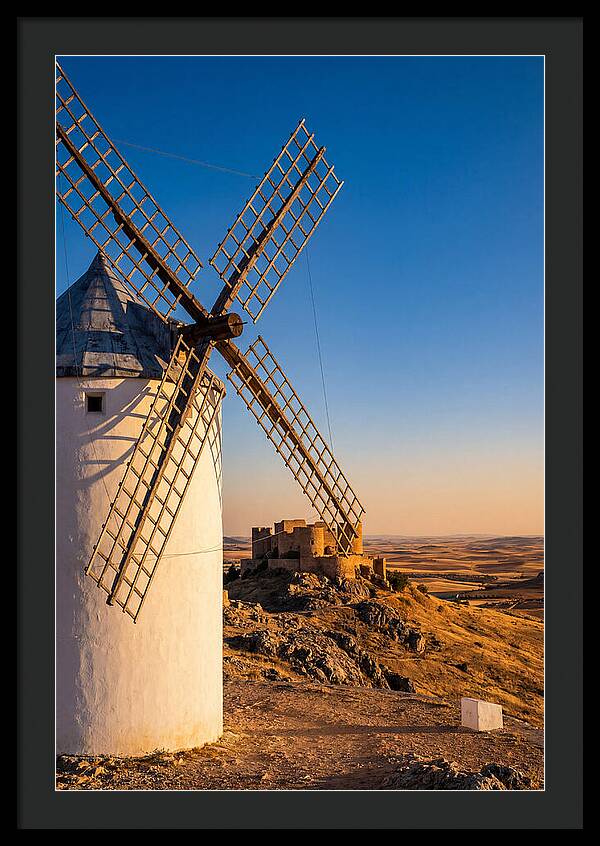 Windmills Against Golden Horizon