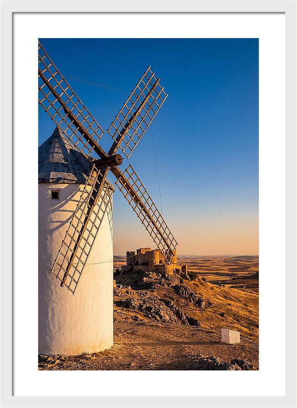 Windmills Against Golden Horizon