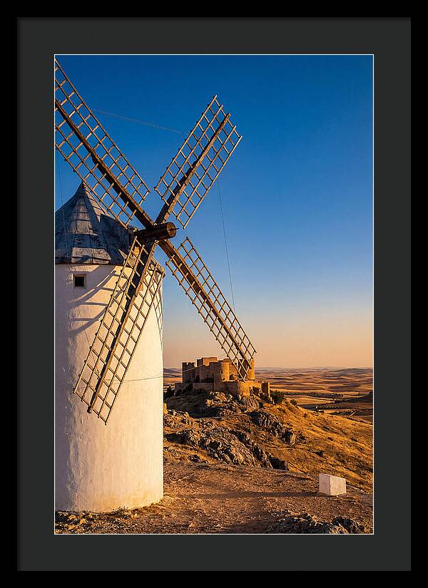 Windmills Against Golden Horizon