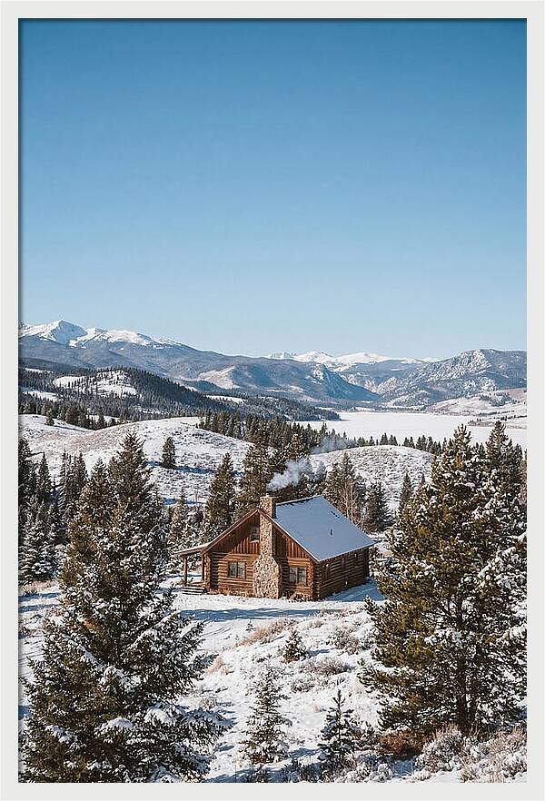 Winter Cabin With Smoke Rising