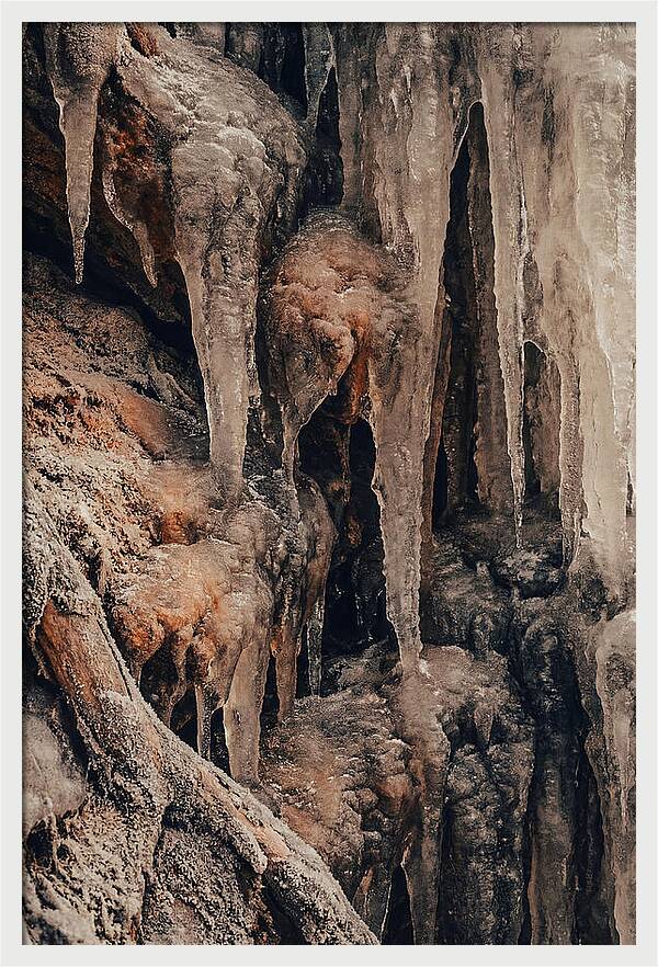 Winter Icicles Hanging From Rock