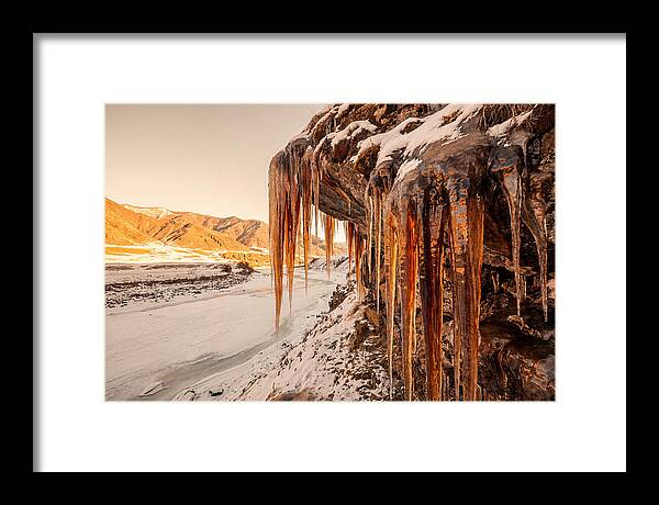 Winter Icicles Hanging From Rock