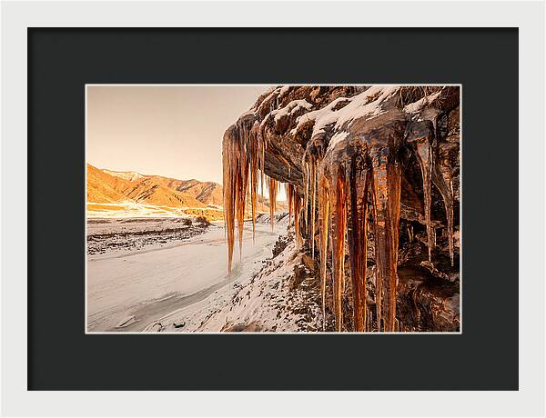 Winter Icicles Hanging From Rock