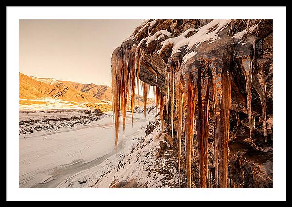 Winter Icicles Hanging From Rock