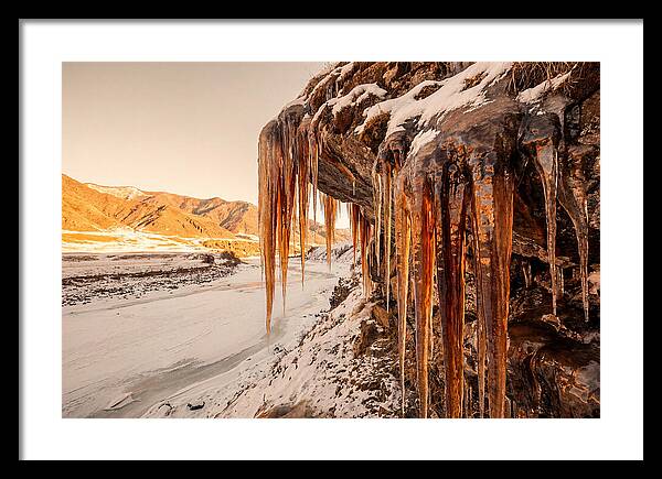 Winter Icicles Hanging From Rock