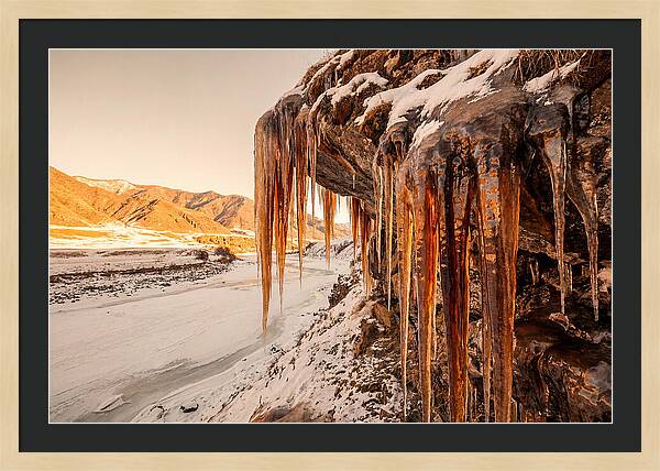 Winter Icicles Hanging From Rock