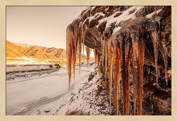 Winter Icicles Hanging From Rock